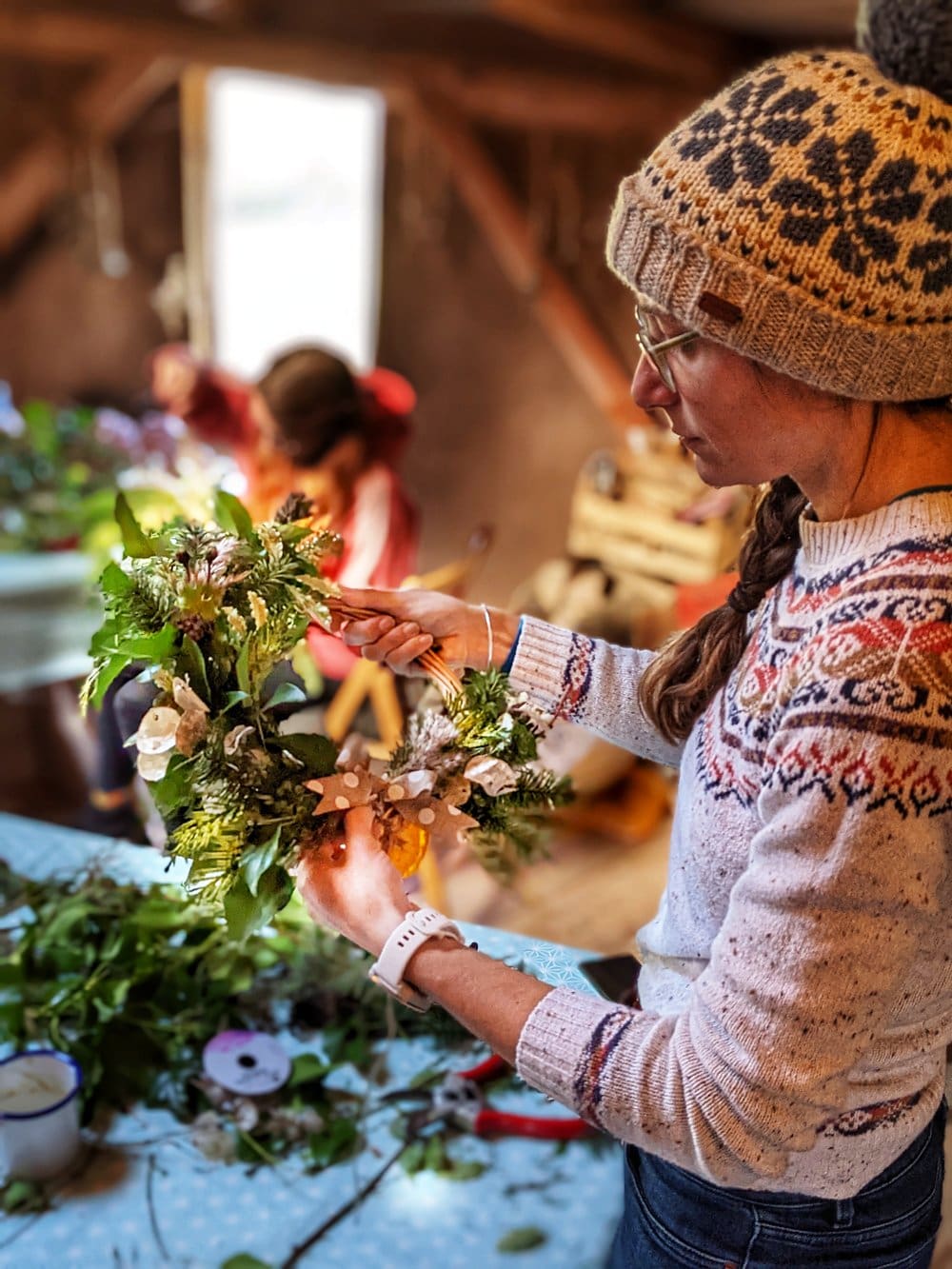 foraged wreath workshop - woman holding newly created wreath